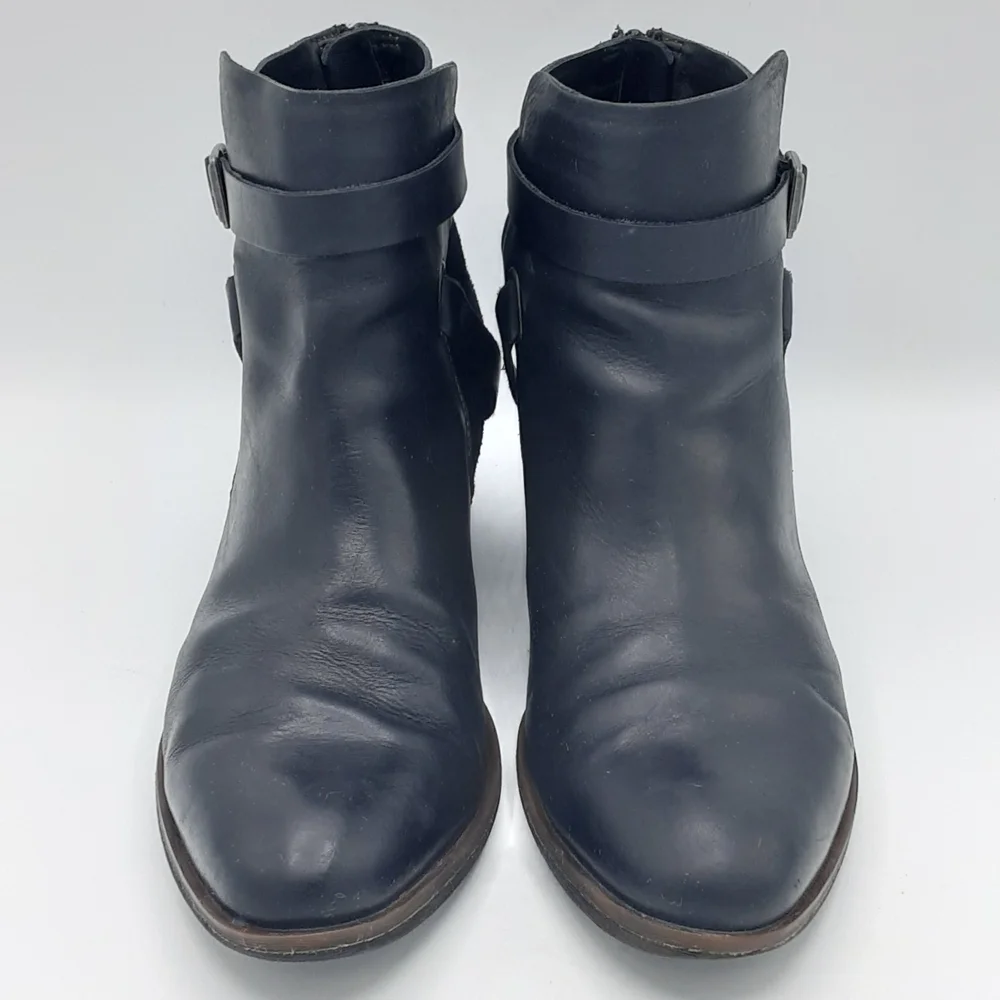 Korks Women's Rohit Black Leather Booties with Buckle Strap